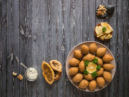 Arabic meat appetizer Kibbeh. Traditional Arabic kibbeh with lamb and pine nuts.