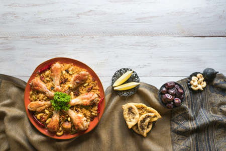 Chicken Mandi with dates. Arabic cuisine. Top view.の写真素材