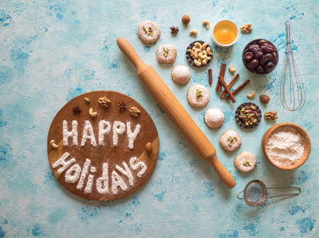 holidays food background. Egg, flour and nuts are laid out on a dark backgroundの写真素材
