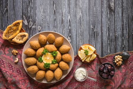Arabic meat appetizer Kibbeh. Traditional Arabic kibbeh with lamb and pine nuts.の写真素材