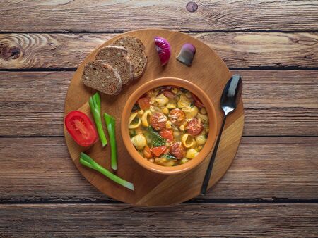 Hot soup with chickpeas and chorizo sausage. Top viewの写真素材