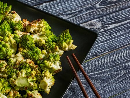 Baked cabbage romanesco with spices. Asian food. Top view.の写真素材