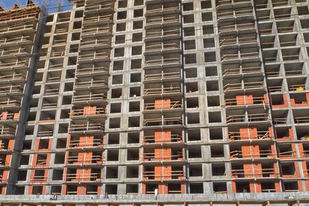 Construction site background. New multi-storey buildings. Industrial background.