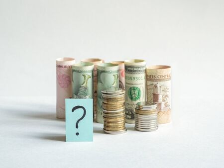 Question mark and money. Pandemic and the economic crisis of the concept. Soft focus.の写真素材