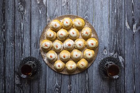 Egyptian cookies "Kahk El Eid", variation with the addition of turmeric when cooking. Cookies of El Fitr Islamic Feast. Ramadan sweets.の写真素材