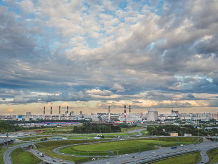 Outskirts of Moscow. A road junction in an industrial area of a modern metropolis. Aerial view.の写真素材