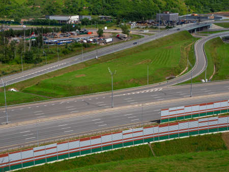 Empty asphalt road and city skyline in Moscow. Motor road, top view.の写真素材