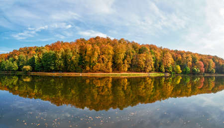 Panorama of the autumn Park. Beautiful autumn landscape with red trees by the lake. Tsaritsyno,...