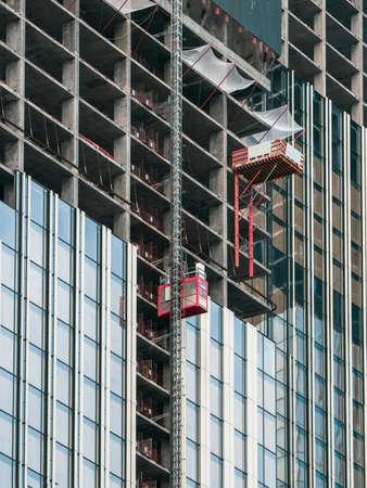 Elevators lifts to the construction sites of a skyscraper under construction