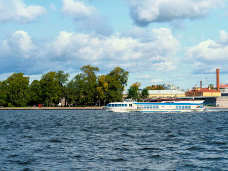 Saint-Petersburg. Speed boat taxi sailing on the river Neva.の写真素材