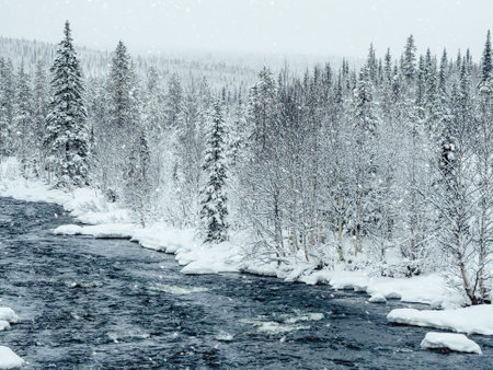 Magical colorful sunset with an old village in the Polar North. view of the winter city of Teriberka. Russia.の写真素材