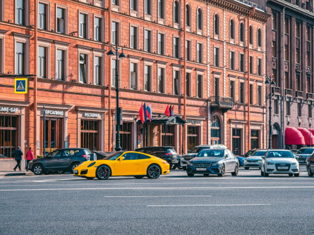Russia, Saint Petersburg, September 25, 2020. Yellow Porsche 911 parked in an outdoor in St. Petersburg.のeditorial素材