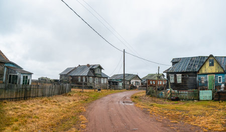A wooden chapel built for the filming of the film. Snowy winter landscape with authentic cinematic house on the shore in the Russian village Rabocheostrovsk.のeditorial素材