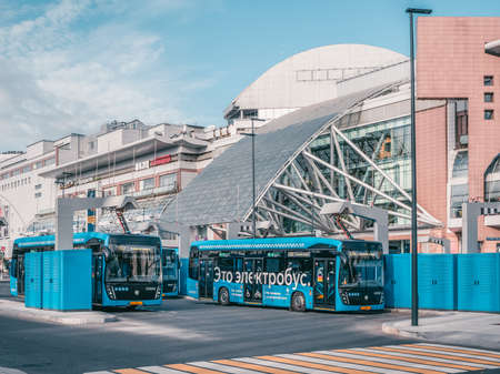Russia, Moscow, September, 30 2020. Tram rides in the autumn tunnel. Tram rails in the corridor of the yellow autumn trees in Moscow.のeditorial素材
