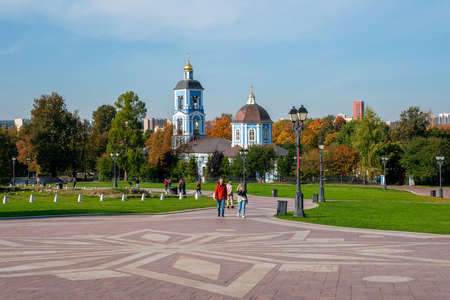 Moscow, Russia, September 30, 2020. Pizza delivery guy rides his bike in the city center.