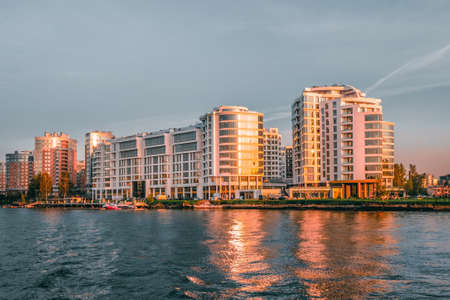 Saint-Petersburg, Russia, september 25, 2020. Luxurious apartments in St. Petersburg, Russia. New modern residential district Petrovsky island. View across the Malaya Nevka river.のeditorial素材
