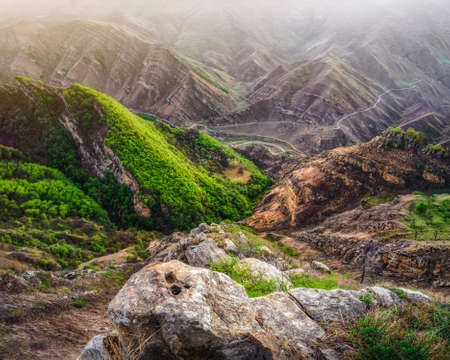 Sunlight in a mountain gorge. Karadakh gorge with sunlight in Dagestan. Vertical panorama.の写真素材