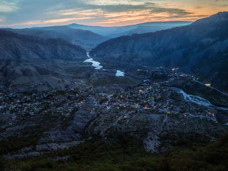Evening view of the mountainous village in Dagestan. A city in a mountain valley. Russia.
