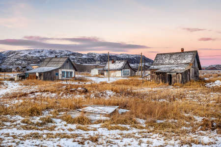 Wild winter snowy Northern forest with river on a polar day. Untouched pure nature. Karelia.の写真素材