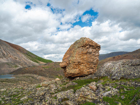 Tourist complex, wooden guest house against the background of snow-covered high mountains.の写真素材