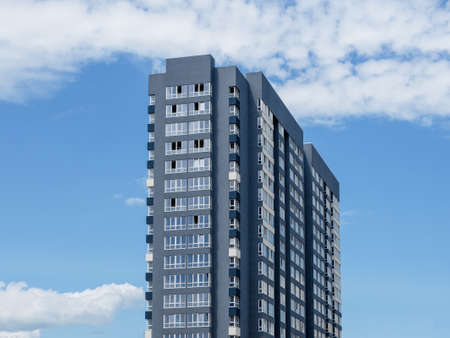 Modern beautiful new buildings. Colored wall on the background of blue sky. copyspace.
