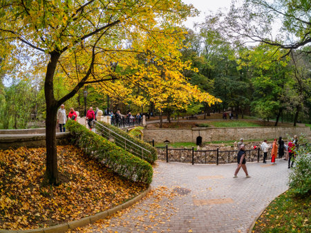 Kislovodsk, Russia - October, 15, 2022: Kislovodsk is a resort town in the Caucasus, Kislovodsk City Park in autumn. People walk along the alleys of the park.のeditorial素材