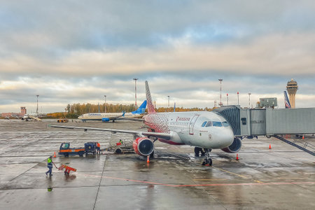 Mineralnye Vody, Russia - October, 09, 2022: Russia Airlines passenger plane boarding passengers. Airbus on the airport in parking position.のeditorial素材