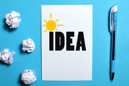 concept crumpled paper light bulb metaphor for good ideaの写真素材
