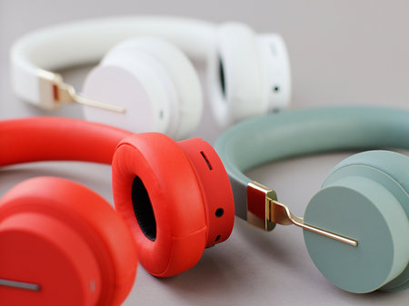 Headphones on grey background. Shallow depth of field. Focus on earphones.の写真素材