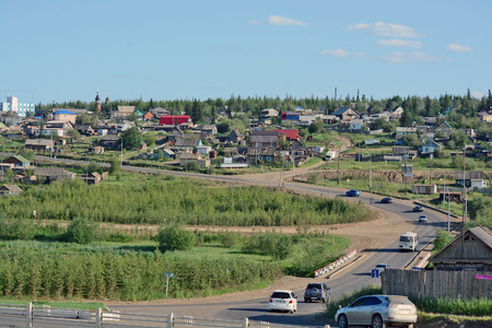 Mirny, Russia - July 7, 2014: Rural area in the town of Mirny, Yakutia. Bridge on the River Irelyakh.のeditorial素材