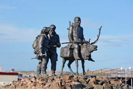 Mirny, Russia - July 7, 2014: The memorial complex "Vilyui ring". Bas "Past, Present and Future diamond edge". Sculptural group "Kayur and geologists". Stella "Yakutia-mother".のeditorial素材
