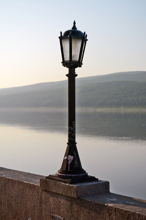 Street lights on the embankment of the River Lena, Lensk, Yakutia, Siberiaの写真素材