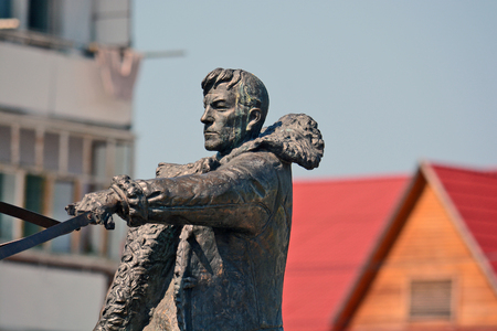 Lensk, Russia - June 21,2014: a monument to the pioneers - the sculptural group from the coachman and horses in Lensk,  Sakha Republic, Russia.のeditorial素材