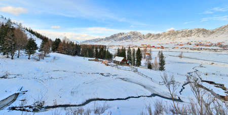 Mountain village winter brookの写真素材