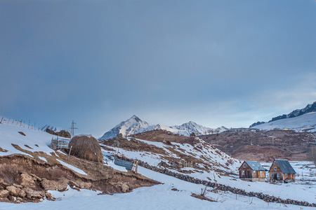 The village on the Kaukaz mountains  at winter time, Gerogia near Gudauriの写真素材