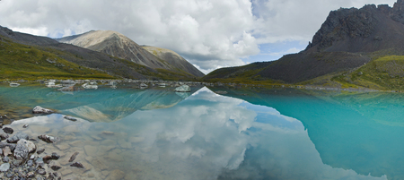 Beautifull valley with view to mountains and  turquoise  lake in Altaj, Russia  at the summerの写真素材