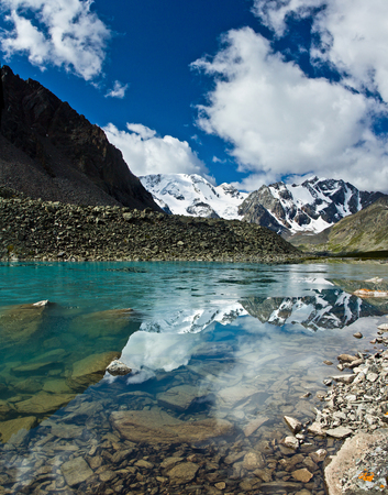 Beautifull turquoise lake with view to mountains in Altaj, Russia  at the summerの写真素材