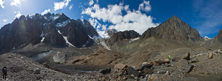 Beautifull valley with view to mountains and  hikers in Altaj, Russia  at the summerの写真素材