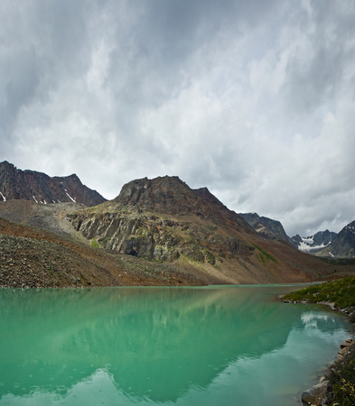 Beautifull valley with view to mountains and  turquoise  lake in Altaj, Russia  at the summerの写真素材