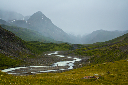 Beautifull valley with view to steppe, river and snow  mountains in Altaj, Russia  at the summerの写真素材