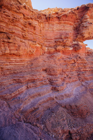 Way in the desert  in the Israil in sunny day with red mountains, green trees and blue sky near Eilatの写真素材