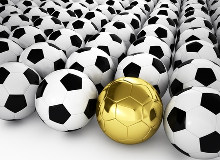 A gold football ball in many white football balls, 3d renderの写真素材