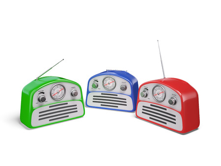 Old colourful vintage retro style radio receivers isolated on white backgroundの写真素材