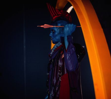 DNIPRO, UKRAINE - JUNE 26, 2019: Cosplayer portraying Yondu Udonta from movie Guardians of the Galaxy by Marvel Comics with the arrow in his hand.のeditorial素材