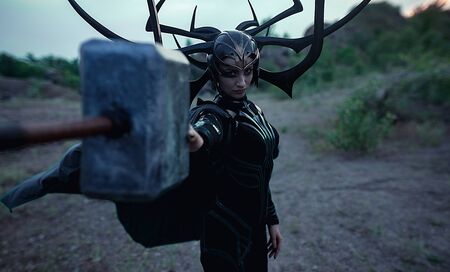 Dnipro, Ukraine- June 5, 2019: Cosplayers portray battle of goddess of death Hela and superhero Thor...