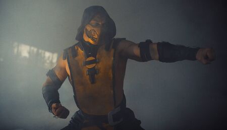 Dnipro, Ukraine - September 29, 2019: Scorpion Cosplayer from the video game Mortal Kombat poses at...
