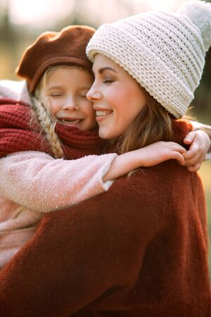 Portrait of happy mother and daughter during stroll.の写真素材