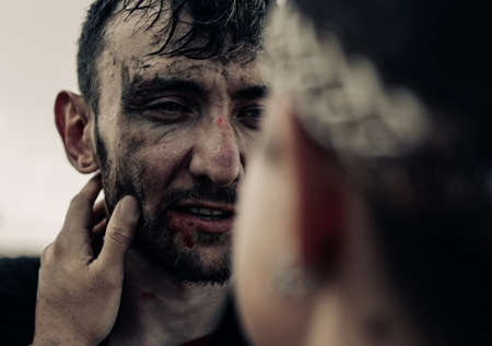 Ancient Spartan warrior says goodbye with his beloved woman before war and long parting. Closeup.の写真素材