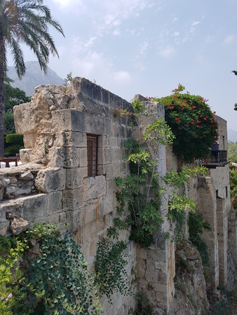 Ancient stone house over the edge Bellapais Abbey, Cyprusの写真素材