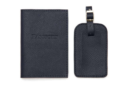 Leather covers for passport, handcrafted work. Brown, white, yellow, beige colors on a white backgroundの写真素材